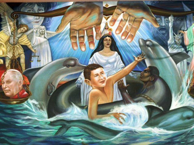 N367120 08: A mural of Elian Gonzalez was carried by supporters to the home of his Miami,