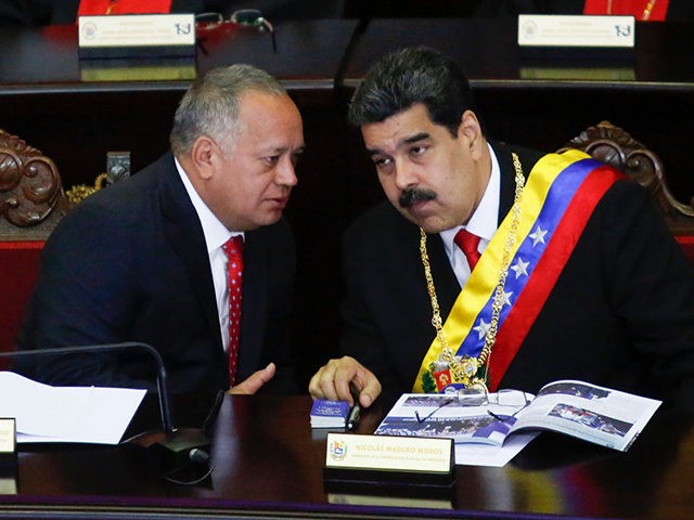 CARACAS, VENEZUELA - JANUARY 24: President of Venezuela Nicolás Maduro (R) talks to Presi