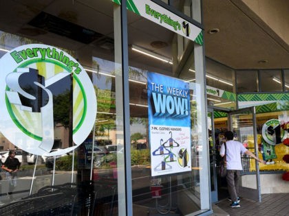 A woman enters a Dollar Tree discount store in Alhambra, California, on August 19, 2019. -