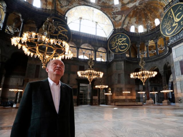 Turkey's President Recep Tayyip Erdogan visits the Byzantine-era Hagia Sophia, one of Istanbul's main tourist attractions in the historic Sultanahmet district of Istanbul, Sunday, July 19, 2020, days after he formally reconverted Hagia Sophia into a mosque and declared it open for Muslim worship, after a high court annulled a …