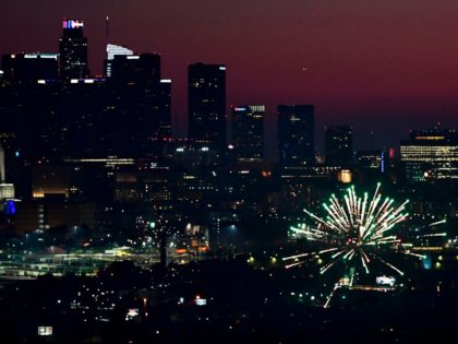 fireworks Fireworks erupt near downtown Los Angeles, California on July 4, 2020 during celebrations for the Fourth of July holiday, amid the coronavirus pandemic. (Photo by Frederic J. BROWN / AFP) (Photo by FREDERIC J. BROWN/AFP via Getty Images)