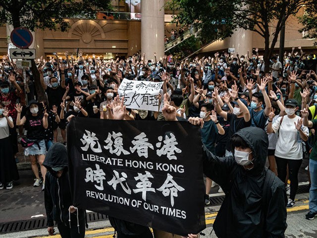 HONG KONG, CHINA - JULY 01: Demonstrators take part in a protest against the new national security law on July 1, 2020 in Hong Kong, China. Hong Kong marks the 23rd anniversary of its handover to China on July 1 after Beijing imposed the new national security law. (Photo by …