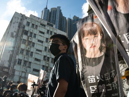 HONG KONG, CHINA - JUNE 19: Pro-democracy activist Joshua Wong speaks to members of media