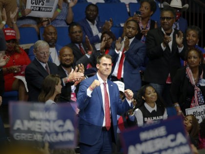 Oklahoma Gov. Kevin Stitt is recognized as President Donald Trump speaks during a campaign