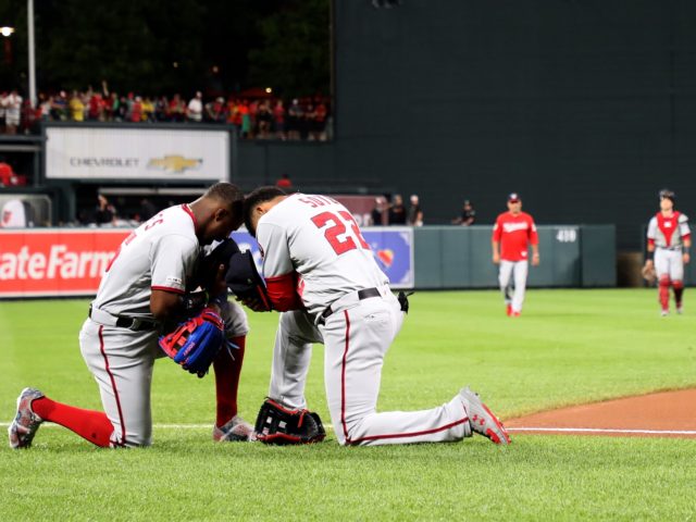 BALTIMORE, MARYLAND - JULY 17: Victor Robles #16 and Juan Soto #22 of the Washington Natio