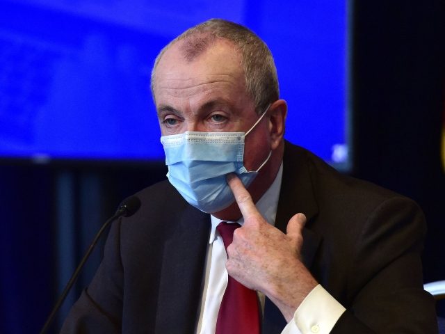 New Jersey Gov, Phil Murphy encourages residents to continue wearing face masks while in public during a coronavirus daily news briefing at the War Memorial building in Trenton, N.J., Friday, June 19, 2020. (Tariq Zehawi/The Record via AP, Pool)