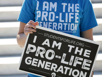 WASHINGTON, DC - JUNE 29: A pro-life activist holds a sign during a demonstration in front of the U.S. Supreme Court June 29, 2020 in Washington, DC. The Supreme Court has ruled today, in a 5-4 decision, a Louisiana law that required abortion doctors need admitting privileges to nearby hospitals …