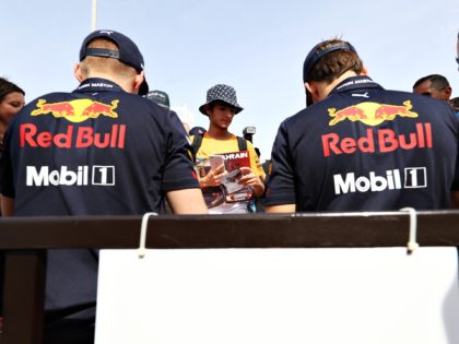 BAHRAIN, BAHRAIN - MARCH 31: Max Verstappen of Netherlands and Red Bull Racing and Pierre Gasly of France and Red Bull Racing sign autographs for fans at the drivers autograph signing session before the F1 Grand Prix of Bahrain at Bahrain International Circuit on March 31, 2019 in Bahrain, Bahrain. …
