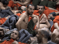 More than 12,000 Islamic State group prisoners are crammed into Kurdish-run detention centres like this one in northeastern Syria, with breakouts an ever-present risk amid a three-week-old Turkish offensive
