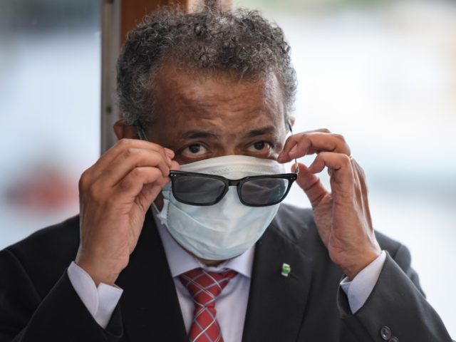 World Health Organization (WHO) Director-General Tedros Adhanom Ghebreyesus wears a mask a