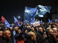 Supporters of China's Muslim Uighur minority wave flags of East Turkestan on December 20, 2019 during a demostration at Fatih in Istanbul. - More than 1,000 protesters marched on December 20, 2019, in Istanbul to protest against China over its treatment of mainly Muslim Uighurs in Xinjiang, an AFP correspondent …