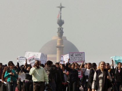 Activists of the All India Democratic Women’s Association and Young Women’s Christian Association (YWCA) and other people shout slogans as they take part in a protest march from the Presidential Palace to India Gate in New Delhi, India, Friday, Dec. 21, 2012. The gang-rape and beating of a 23-year-old student …