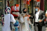 Iran says virus death toll tops 13,000