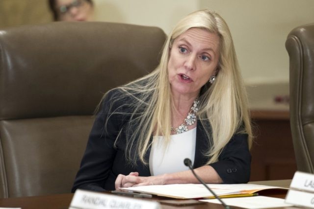 In this June 14, 2018, file photo Federal Reserve Board Governor Lael Brainard participates in an open meeting in Washington. Brainard warned Tuesday, July 14, 2020, that the U.S. economy appears to be slowing after an initial burst of recovery and called for the Fed to take aggressive steps to …