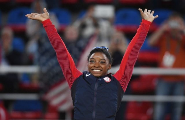 Simone Biles cites racism in gymnasts, support for protests - Breitbart