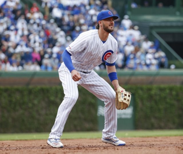 Cubs' Kris Bryant turns rare triple play in loss to Reds