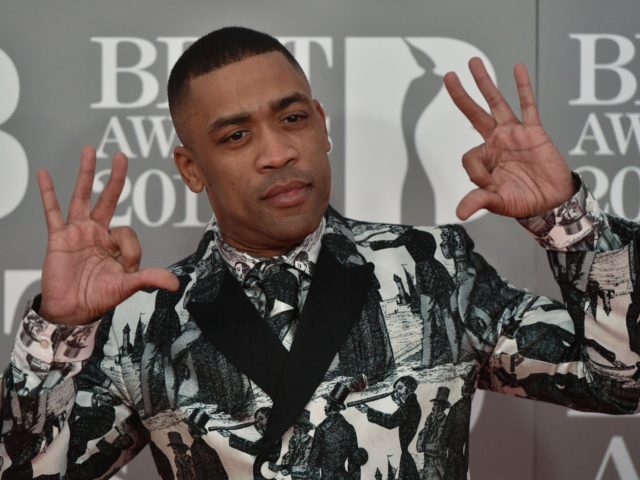 British rapper Wiley poses on the red carpet arriving for the BRIT Awards 2017 in London o