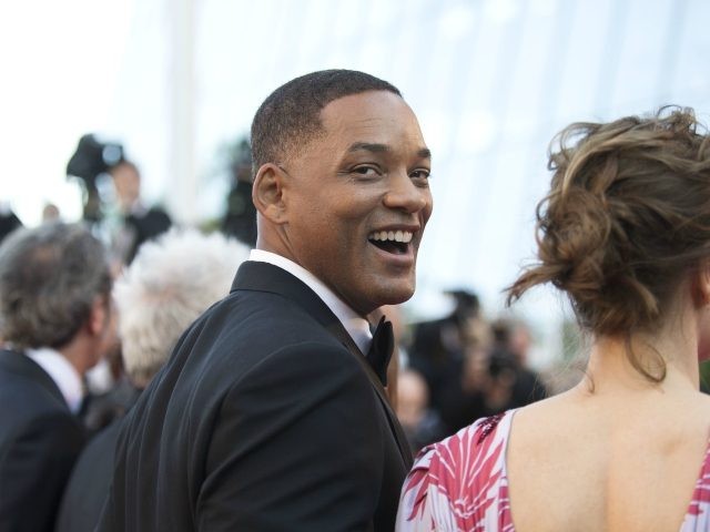 Actor/jury member Will Smith poses for photographers upon arrival at the opening ceremony