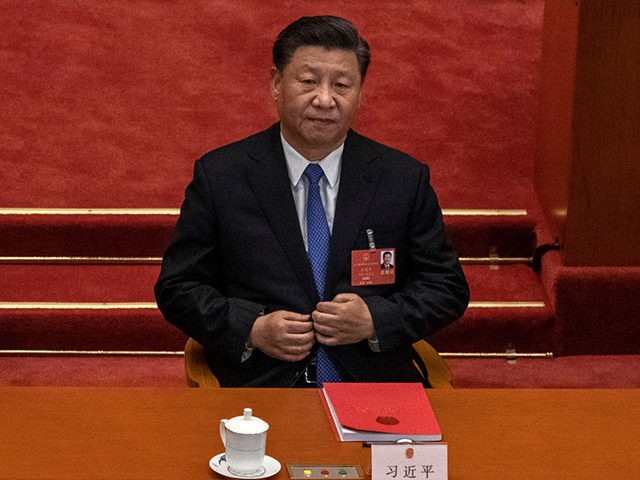 BEIJING, CHINA - MAY 28: Chinese president Xi Jinping listens during the closing session of the National People's Congress, which included a vote on a new draft security bill for Hong Kong, at the Great Hall of the People on May 28, 2020 in Beijing, China. The Chinese government passed …