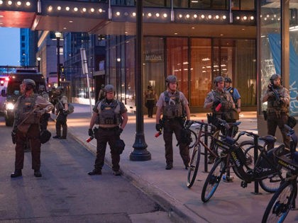 Hennepin County Sheriffs Officers patrol outside the Norstrom Rack and IDS Center in Minne