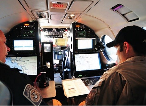 CBP Air and Marine Operations agents operate sensor equipment during an air operation. (Photo: U.S. Customs and Border Protection/Air and Marine Operations)