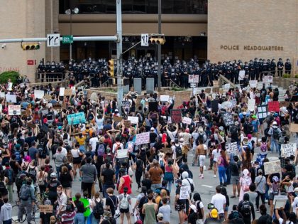 Protesters rally around Austin Police Department headquarters calling for defunding of police. (File Photo: KUT/University of Texas)
