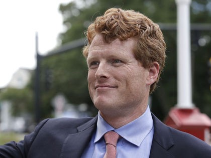 U.S. Rep. Joe Kennedy III, D-Mass., smiles after a news conference, Tuesday, Aug. 27, 2019, in Newton, Mass. Kennedy III, a scion of one of America's most storied political families, is taking steps to challenge U.S. Sen. Edward Markey, D-Mass., in the 2020 Democratic primary, setting the stage for what …