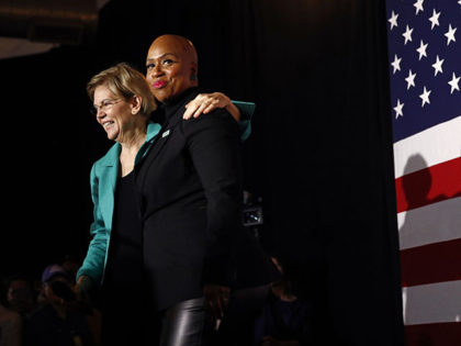 Democratic presidential candidate Sen. Elizabeth Warren, D-Mass., left, stands onstage with Rep. Ayanna Pressley, D-Mass., before speaking at a campaign event, Monday, Feb. 24, 2020, in Charleston, S.C. (AP Photo/Patrick Semansky)