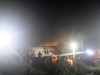 The Air India Express flight that skidded off a runway while landing at the airport in Kozhikode, Kerala state, India, Friday, Aug. 7, 2020. The special evacuation flight bringing people home to India who had been trapped abroad because of the coronavirus skidded off the runway and split in two …