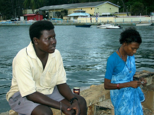 This picture taken 27 December 2005 after the first anniversary of the deadly tsunami that devasted much of Asia, Mion (L), a member of near extinct Great Andamanese aboriginal tribe, sits with his sister Ichika by the waterfront in Port Blair. The memory of the thousands listed as missing since …