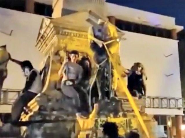 Confederate Monument Pulled Down, Falls on Protester