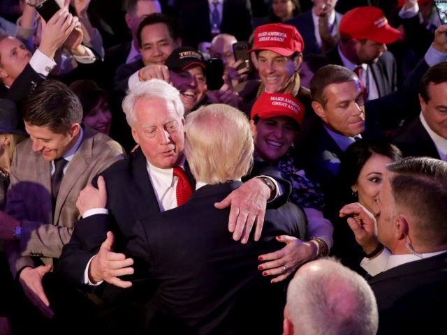 Republican president-elect Donald Trump hugs his brother Robert Trump after delivering his