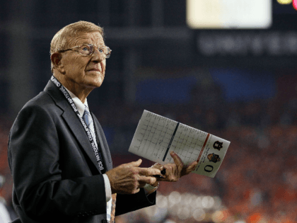 ESPN reporter Lou Holtz looks on during the Tostitos BCS National Championship Game betwee