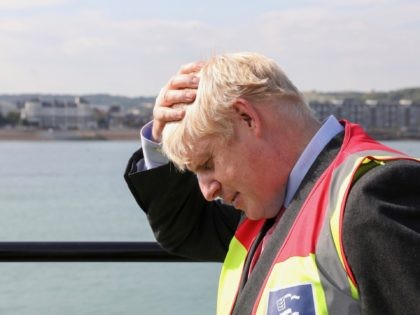DOVER, ENGLAND - JULY 11: Boris Johnson gestures during a visit to the Port of Dover Ltd.,