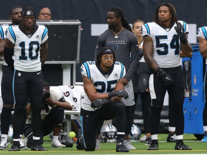 HOUSTON, TEXAS - SEPTEMBER 29: Eric Reid #25 of the Carolina Panthers kneels during the national anthem before playing the Houston Texans at NRG Stadium on September 29, 2019 in Houston, Texas. (Photo by Bob Levey/Getty Images)