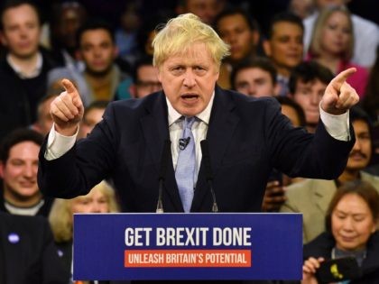 TOPSHOT - Britain's Prime Minister and Conservative party leader Boris Johnson speaks duri