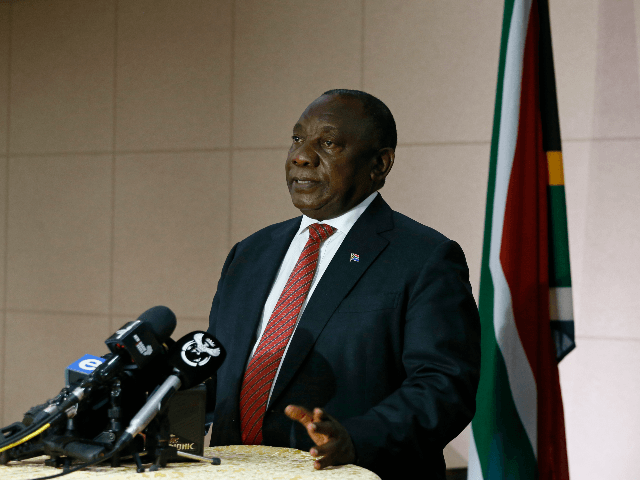 South African President Cyril Ramaphosa conduct a press conference moments after concluding a virtual extraordinary G20 Leaders' Summit on a coordinated international response to the current COVID-19 pandemic at the South African Reserve Bank, in Pretoria on March 26, 2020. - South African President Cyril Ramaphosa on March 23, 2020 …