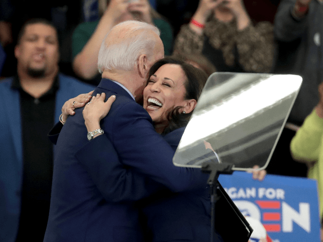 Sen. Kamala Harris (L) (D-CA), hugs Democratic presidential candidate former Vice President Joe Biden after introducing him at a campaign rally at Renaissance High School on March 09, 2020 in Detroit, Michigan. Michigan will hold its primary election tomorrow. (Photo by Scott Olson/Getty Images)