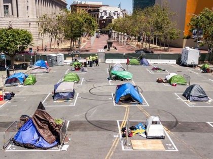 Rectangles are painted on the ground to encourage homeless people to keep social distancin
