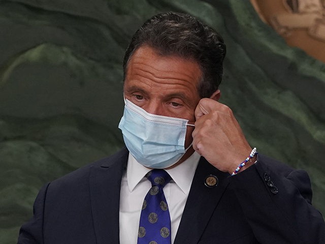 New York Governor Andrew Cuomo speaks at a news conference on July 6 ,2020 in New York City, where he announced that President Donald Trump is enabling the coronavirus pandemic by not wearing a mask and downplaying the problem. (Photo by TIMOTHY A. CLARY / AFP) (Photo by TIMOTHY A. …
