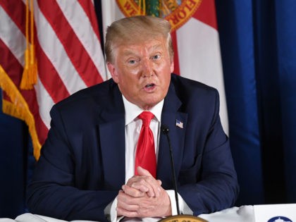 US President Donald Trump holds a COVID-19 and storm preparedness roundtable in Belleair, Florida, July 31, 2020. (Photo by SAUL LOEB / AFP) (Photo by SAUL LOEB/AFP via Getty Images)
