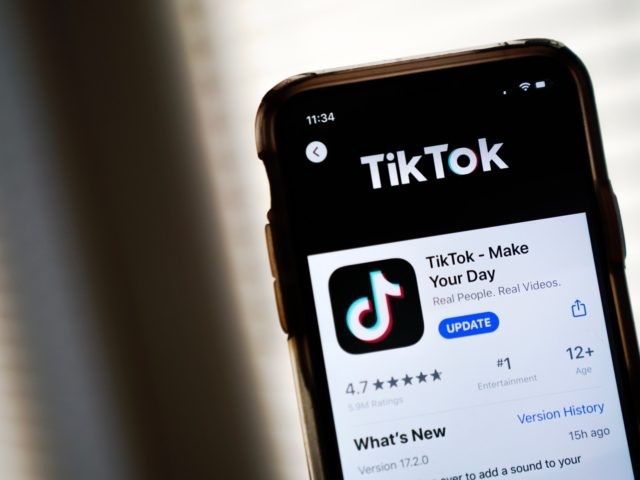 WASHINGTON, DC - AUGUST 07: In this photo illustration, the download page for the TikTok app is displayed on an Apple iPhone on August 7, 2020 in Washington, DC. On Thursday evening, President Donald Trump signed an executive order that bans any transactions between the parent company of TikTok, ByteDance, …