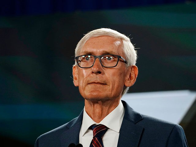 MILWAUKEE, WISCONSIN - AUGUST 19: Wisconsin Governor Tony Evers awaits to address the virt