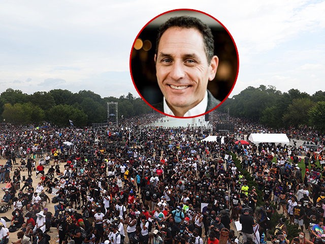 (INSET: CNN guest Dr. Rob Davidson) Demonstrators gather on the National Mall during the "Commitment March: Get Your Knee Off Our Necks" protest against racism and police brutality, on August 28, 2020, in Washington DC. - Anti-racism protesters marched on the streets of the US capital on Friday, after a …