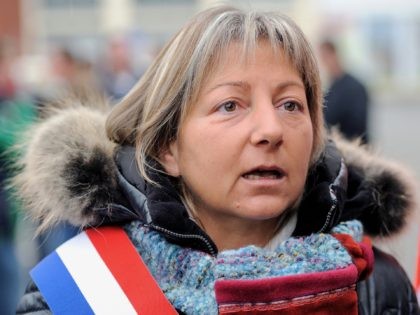 Mayor of Calais Natacha Bouchart attends in Calais, northern France, on November 2, 2013, a demonstration supporting the employees of pharmaceutical chemical components manufacturer Calaire Chimie, in liquidation, and sheet metal specialist LK Industries, which threatens to close. Between 350 and 500 people demonstrated in Calais against a plan to …