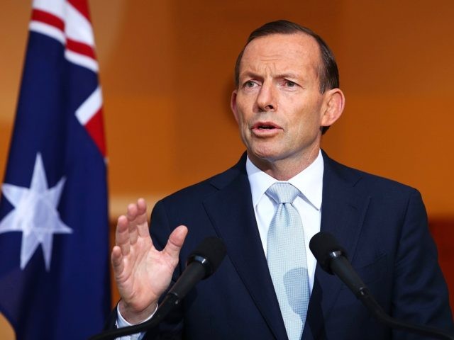 CANBERRA, AUSTRALIA - JULY 18: Australian Prime Minister Tony Abbott addresses the media during a press conference at Parliament House on July 18, 2014 in Canberra, Australia. 27 Australians were on board the Malaysia Airlines flight MH17 which was reportedly shot down over Eastern Ukraine. Reports that a surface-to-air missile …