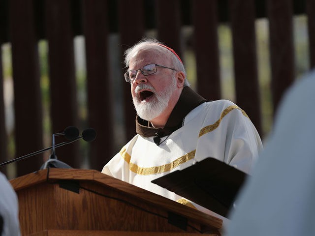 NOGALES, AZ - APRIL 01: Archbishop of Boston Cardinal Sean O'Malley speaks next to the U.S.-Mexico border fence during a special 'Mass on the Border' on April 1, 2014 in Nogales, Arizona. Catholic bishops led by Cardinal O'Malley held the mass to pray for comprehensive immigration reform and for those …