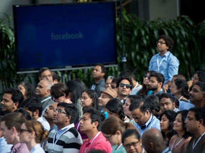 People attend a Townhall meeting with Indian Prime Minister Narendra Modi and Facebook CEO Mark Zuckerberg at Facebook headquarters in Menlo Park, California, on September 27, 2015. AFP PHOTO / SUSANA BATES (Photo credit should read SUSANA BATES/AFP via Getty Images)