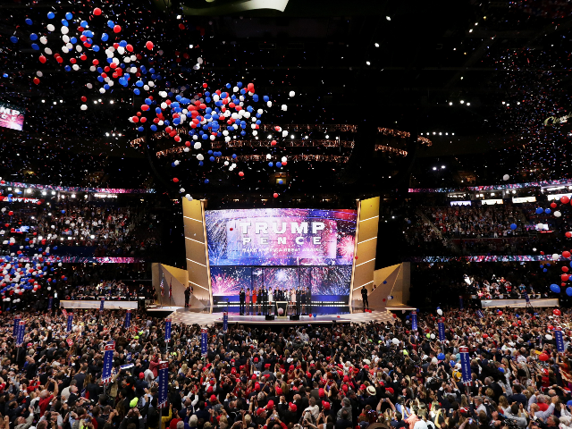Republican presidential candidate Donald Trump (Center-L) and Republican vice presidential candidate Mike Pence (Center-R) stand with their families at the end of the Republican National Convention on July 21, 2016 at the Quicken Loans Arena in Cleveland, Ohio. Republican presidential candidate Donald Trump received the number of votes needed to …