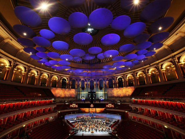 LONDON, ENGLAND - AUGUST 21: Musicians of The West-Eastern Divan youth orchestra, conducted by Daniel Barenboim rehearse in the Royal Albert Hall ahead of their performace in the BBC Proms tonight on August 21, 2009 in London, England. The orchestra was founded by Daniel Barenboim, an Argentine of Jewish descent …